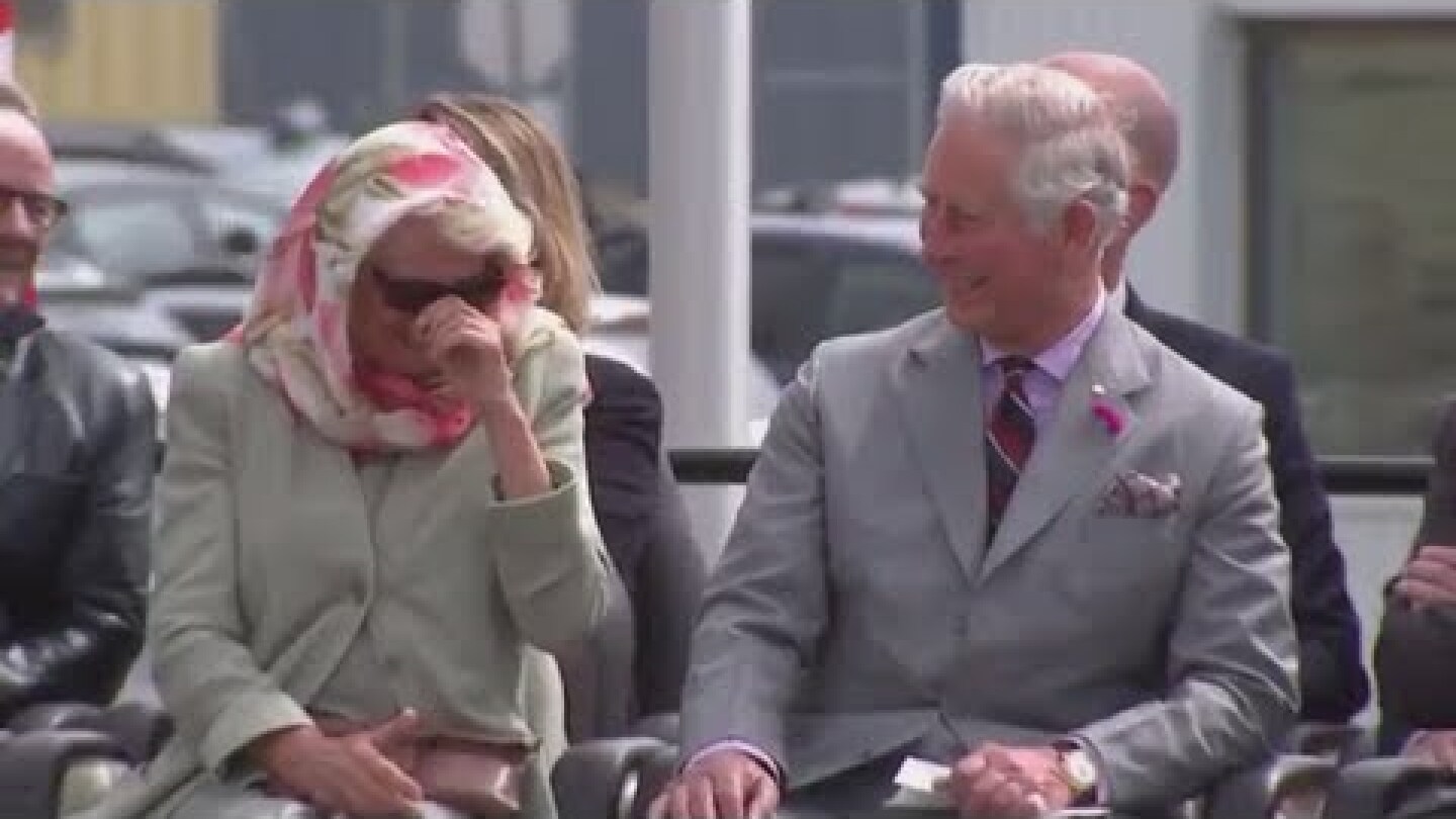 Charles and Camilla Laughing As They Struggle With Giggles
