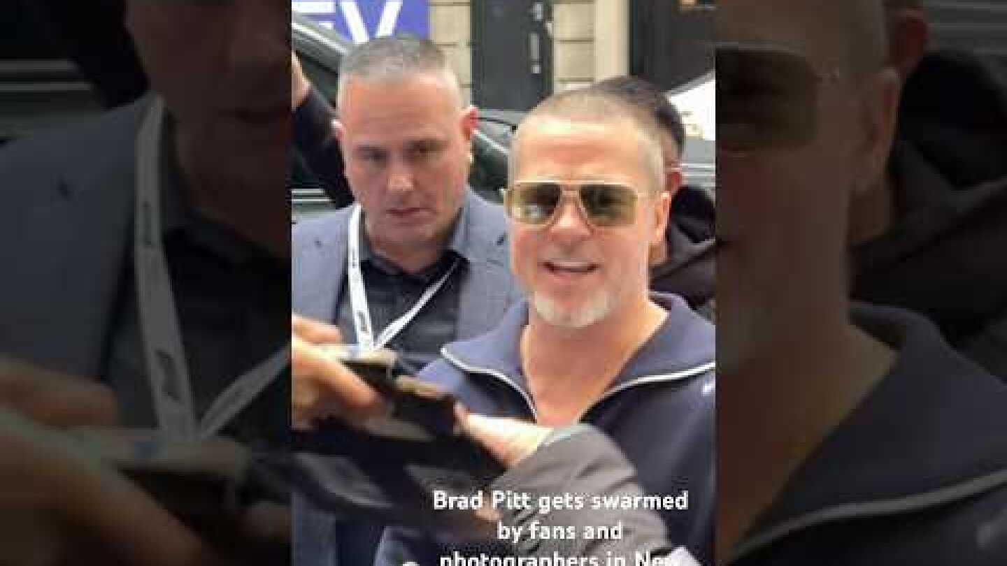 Brad Pitt gets swarmed by fans and photographers in New York on Father’s Day today#bradpitt #newyork