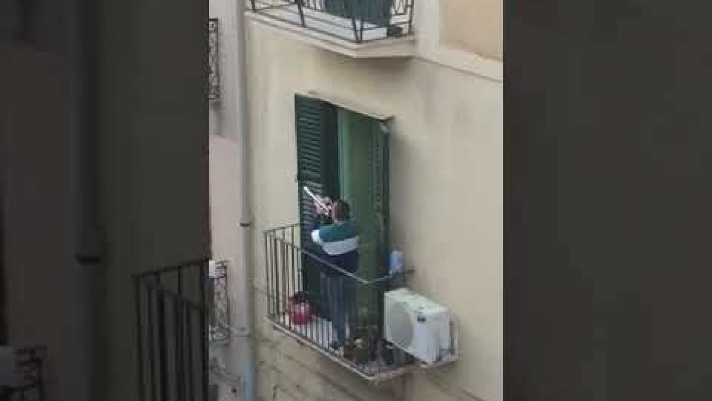 Trumpeter Performs 'Imagine' on Italian Balcony During Coronavirus Lockdown