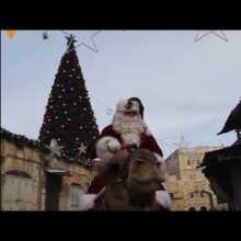 Palestinian Christian Issa Kassissieh Plays Santa in Jerusalem