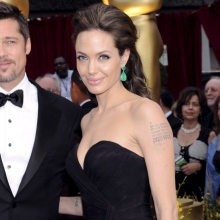 Brad Pitt and Angelina Jolie arrive on the red carpet for the 81st Academy Awards at the Kodak Theatre in Hollywood, California, 2009. © EPA/ANDREW GOMBERT