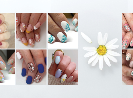 Γυναικεία χέρια με βαμμένα νύχια και σχέδια λουλούδια