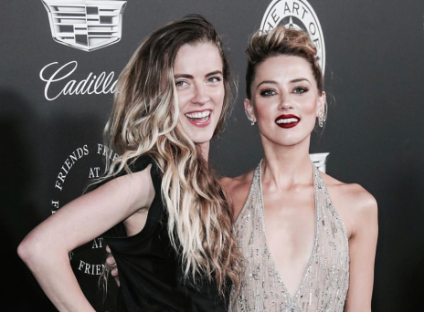 Γουίτνεϊ Ενρίκες και Άμπερ Χερντ