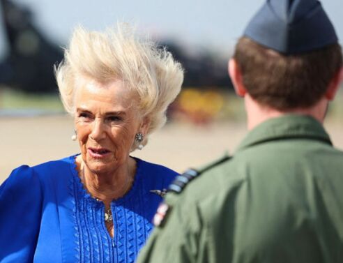 The Queen’s hair goes wild on visit to RAF base