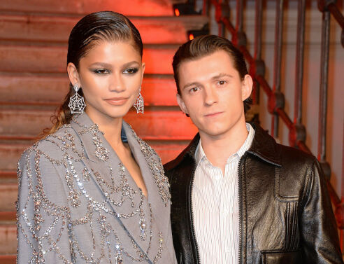 LOS ANGELES, CALIFORNIA - DECEMBER 13: (L-R) Tom Holland and Zendaya attend Sony Pictures' "Spider-Man: No Way Home" Los Angeles Premiere on December 13, 2021 in Los Angeles, California. (Photo by Emma McIntyre/Getty Images)