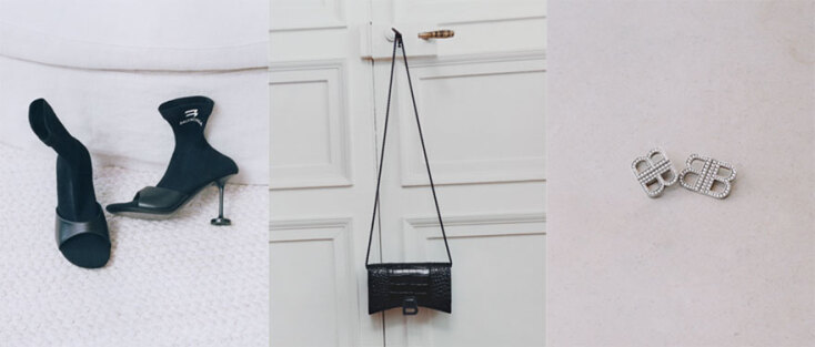 Μπότες, μαύρη τσάντα, σκουλαρίκια Balenciaga